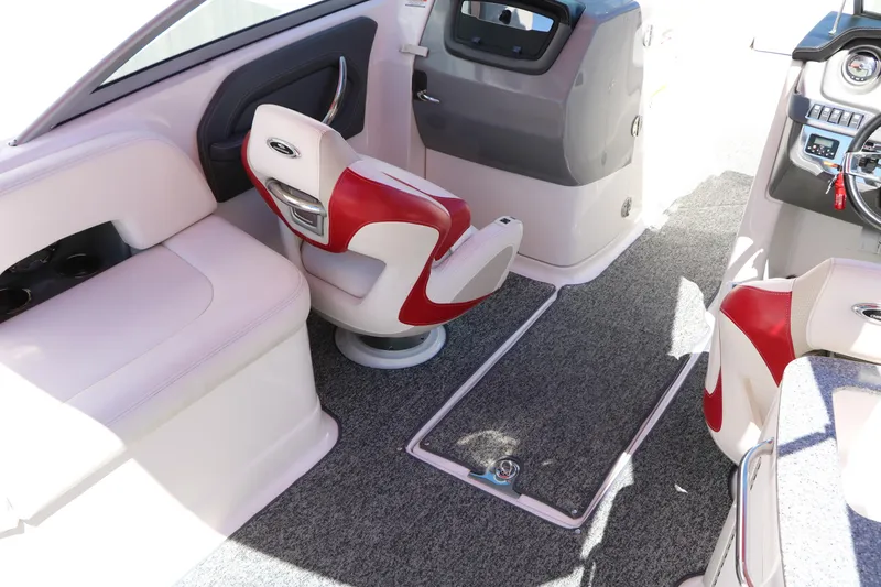 Slide: The Image of Interior of 2014 Chaparral 244 Xtreme boat with red and white seating. - 29