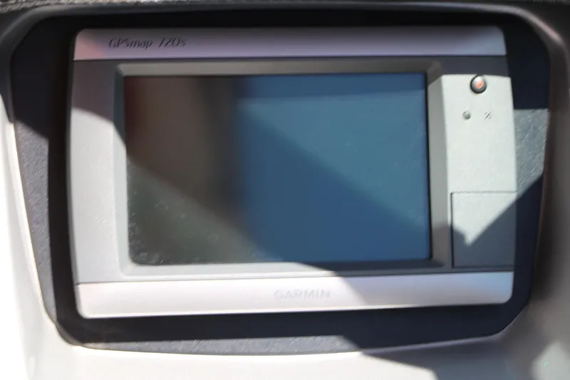 Slide: The Image of Garmin GPSmap 740s display on 2014 Chaparral 244 Xtreme boat dashboard. - 32