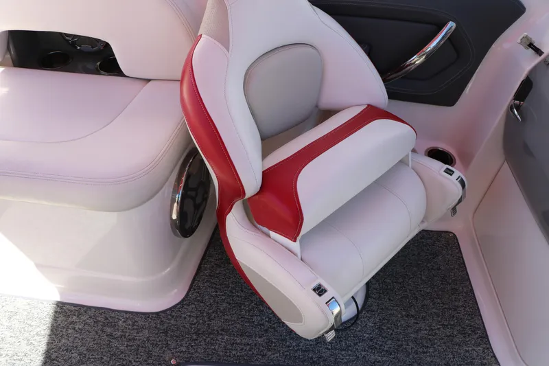 Slide: The Image of 2014 Chaparral 244 Xtreme boat seat with red and white upholstery. - 48