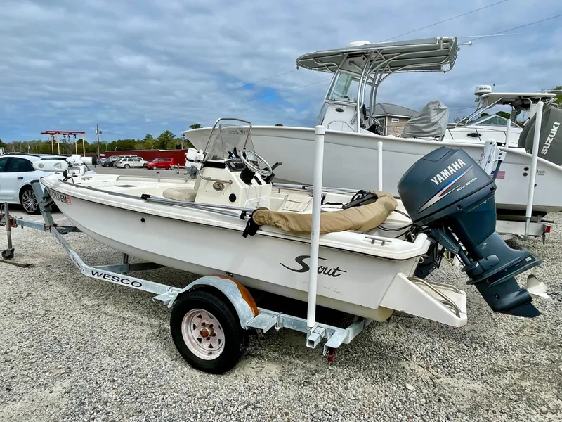 Slide: The Image of 2004 Scout Sportfish 160 boat on trailer with Yamaha motor. - 2