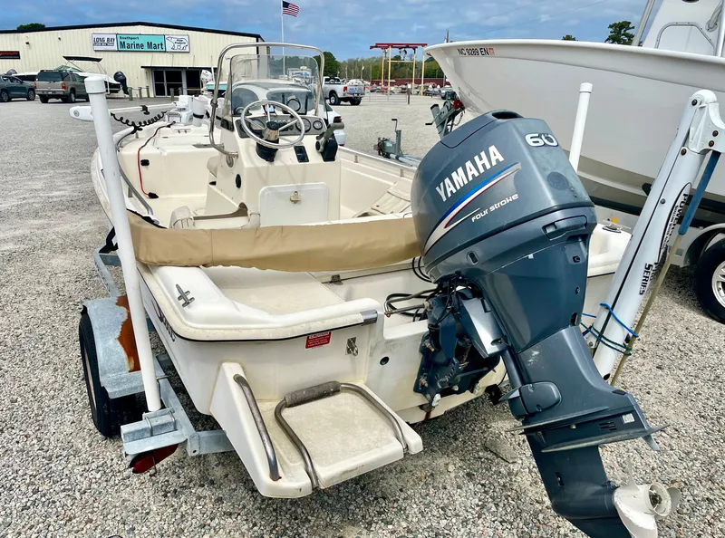 Slide: The Image of 2004 Scout Sportfish 160 boat with Yamaha 60 outboard motor. - 3