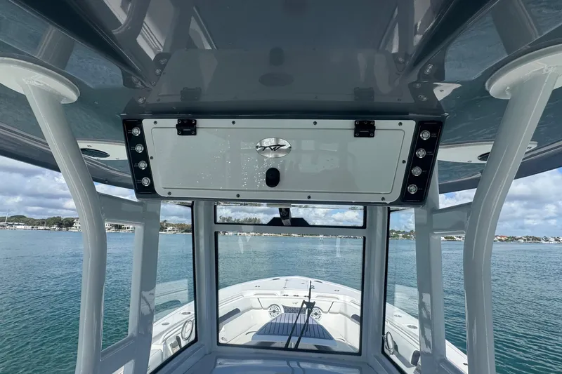 Slide: The Image of 2023 Tidewater 292 CC Adventure boat interior with ocean view. - 11