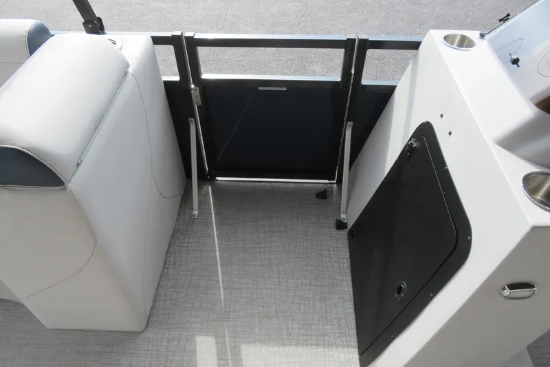 Slide: The Image of Interior of Avalon Venture 85 Rear Fish 2026 with seating and storage. - 12