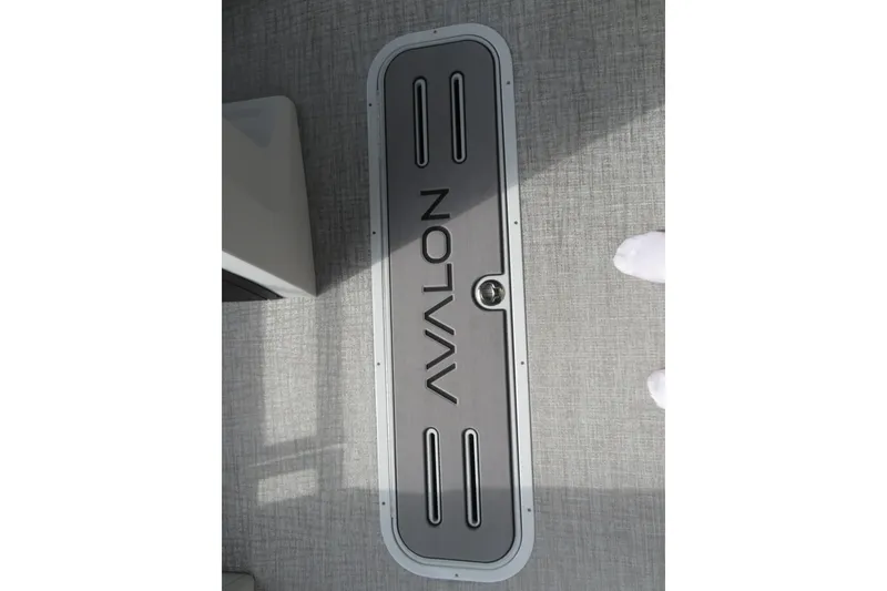 Slide: The Image of Avalon Venture 85 boat deck, 2026 model, gray surface. - 17