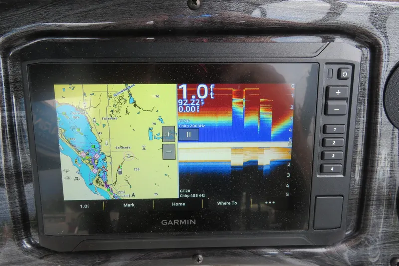Slide: The Image of Garmin fishfinder on Avalon Venture 85 boat, displaying maps and depth readings. - 33