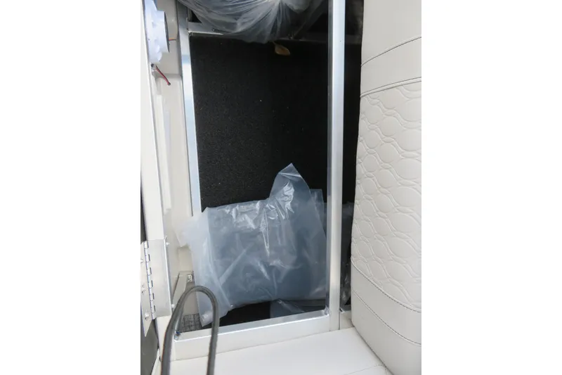 Slide: The Image of Interior of Avalon Venture 85 Rear Fish 2026 with storage space. - 44