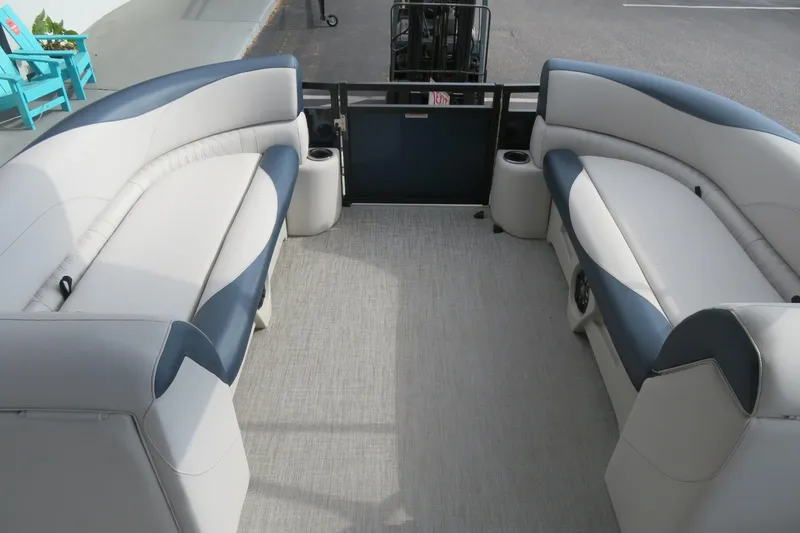 Slide: The Image of Interior of Avalon Venture 85 Rear Fish 2026 with blue and white seating. - 9