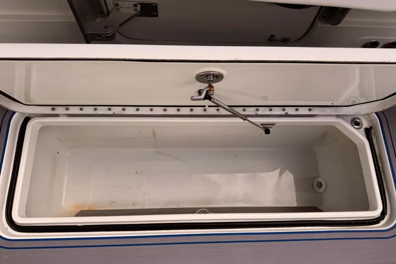 Slide: The Image of Open storage compartment on a 2016 Hydra-Sports 4200 Siesta boat. - 12