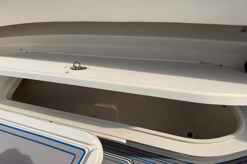 Slide: The Image of Open storage compartment on a 2016 Hydra-Sports 4200 Siesta boat. - 23
