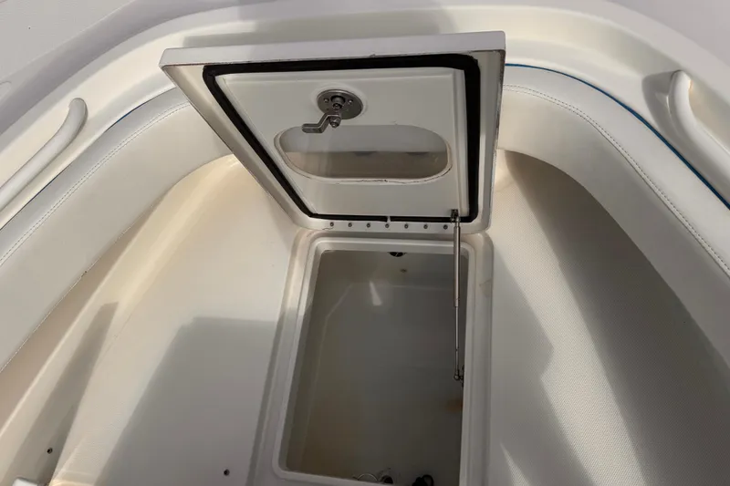 Slide: The Image of Open storage compartment on a 2016 Hydra-Sports 4200 Siesta boat. - 24