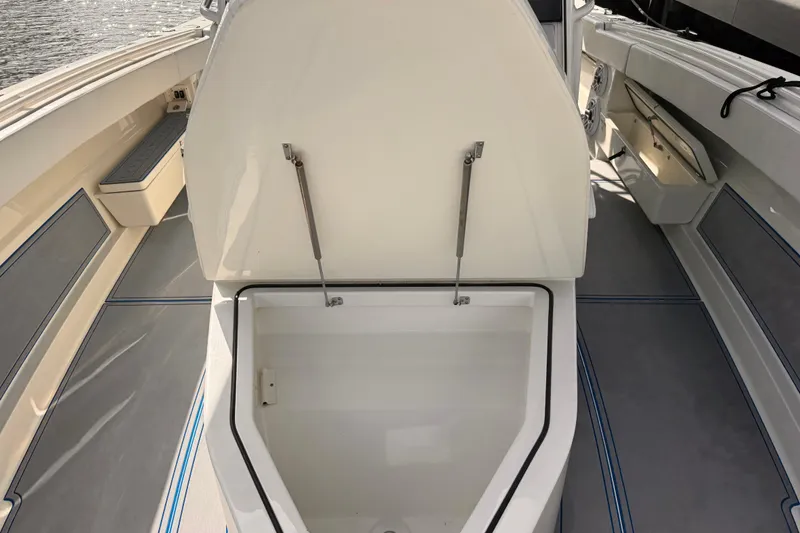 Slide: The Image of 2016 Hydra-Sports 4200 Siesta boat interior with open storage compartment. - 25