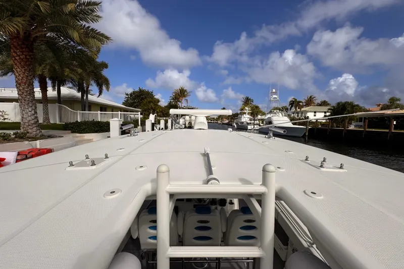 Slide: The Image of 2016 Hydra-Sports 4200 Siesta boat docked in a scenic marina under a blue sky. - 28