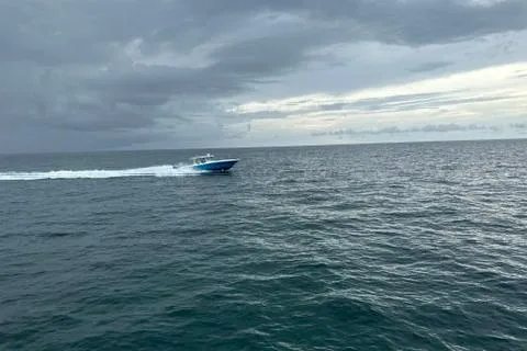 Slide: The Image of 2016 Hydra-Sports 4200 Siesta cruising on open ocean under cloudy skies. - 35