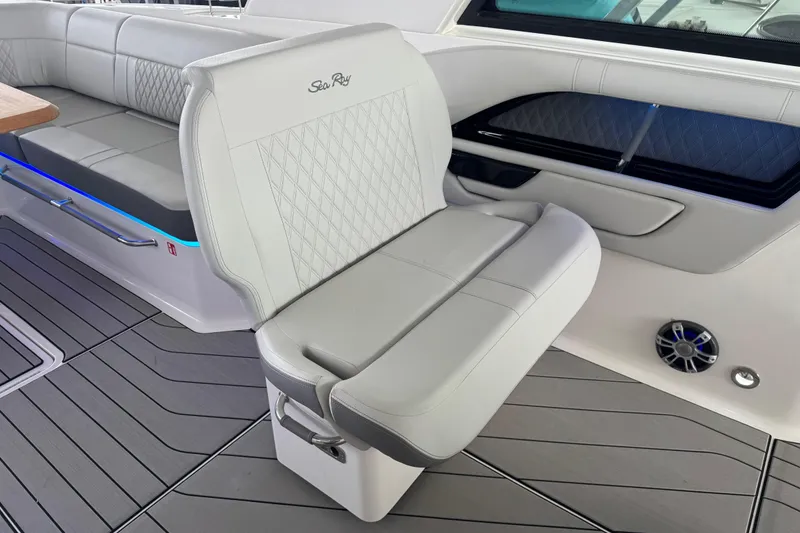 Slide: The Image of 2025 Sea Ray SLX 400 boat interior with luxurious seating and modern design. - 16