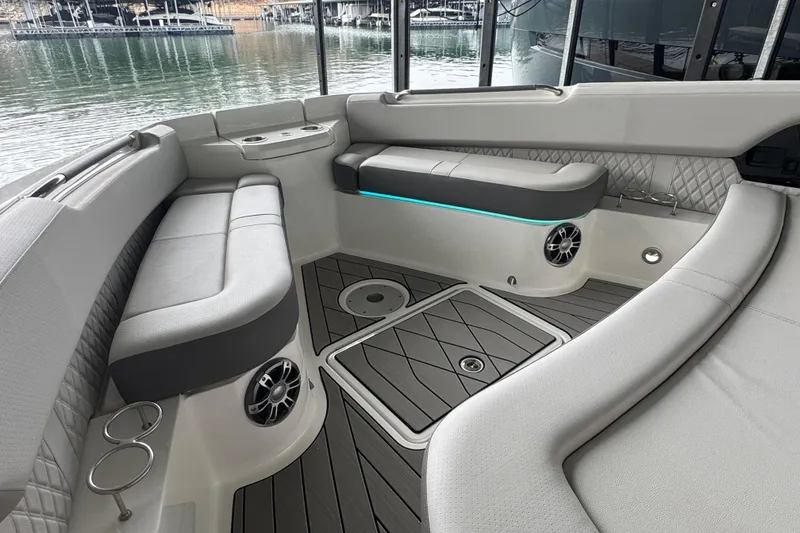 Slide: The Image of Luxurious seating area on 2025 Sea Ray SLX 400 boat, featuring modern design and comfort. - 19