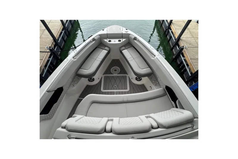 Slide: The Image of 2025 Sea Ray SLX 400 boat interior with luxurious seating and sleek design. - 20
