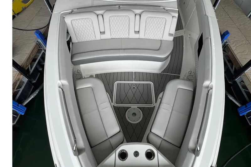 Slide: The Image of 2025 Sea Ray SLX 400 boat interior with luxurious seating and sleek design. - 21