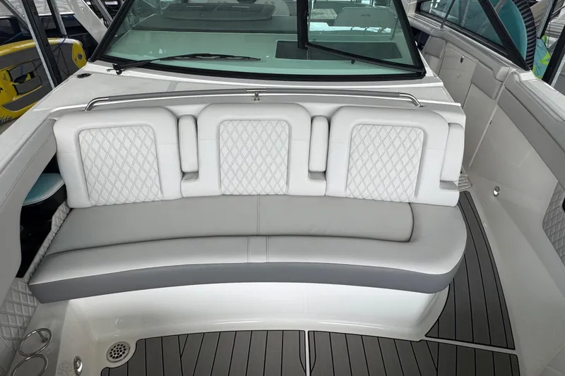 Slide: The Image of 2025 Sea Ray SLX 400 boat interior with luxurious seating and modern design. - 22