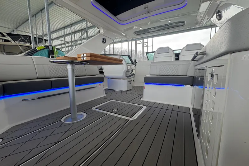 Slide: The Image of Luxurious 2025 Sea Ray SLX 400 boat interior with sleek seating and modern design. - 7