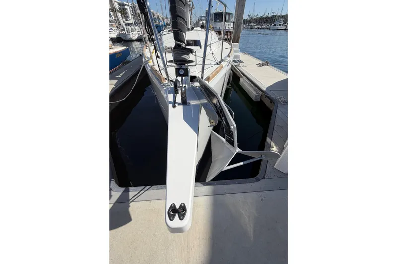 Slide: The Image of 2024 Jeanneau Sun Odyssey 349 sailboat docked at marina, bow view. - 18