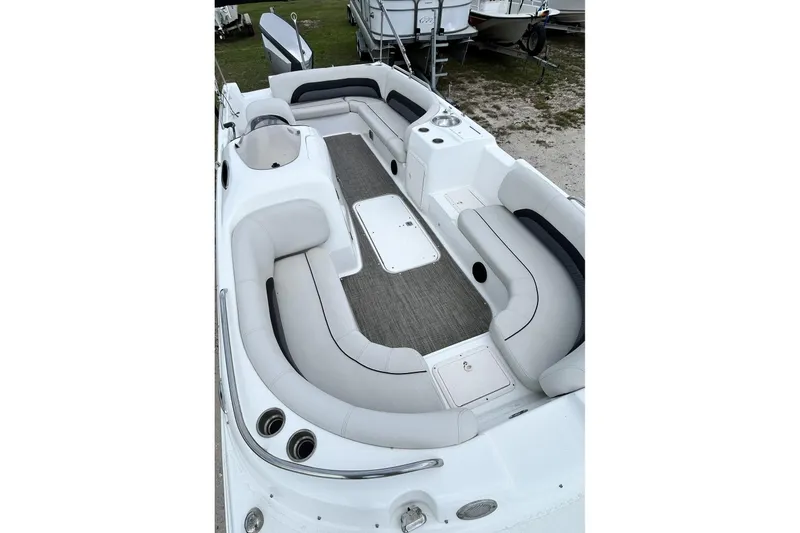 Slide: The Image of 2018 Hurricane SunDeck Sport 232 OB boat interior with spacious seating and modern design. - 16