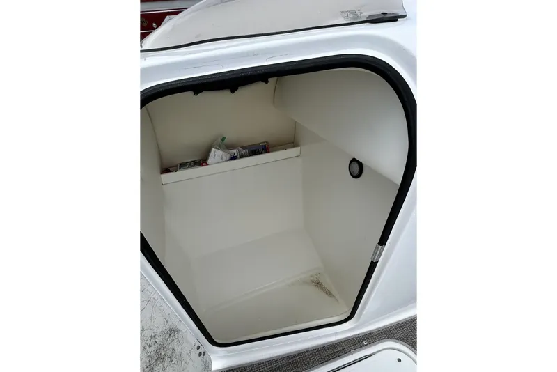 Slide: The Image of Storage compartment of a 2018 Hurricane SunDeck Sport 232 OB boat. - 22