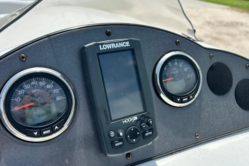 Slide: The Image of Dashboard of 2018 Hurricane SunDeck Sport 232 OB with Lowrance Hook 4 display. - 29