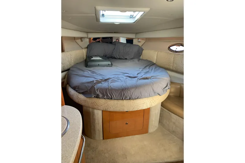 Slide: The Image of Cozy cabin interior of 2007 Chaparral 350 Signature yacht with a comfortable bed. - 10