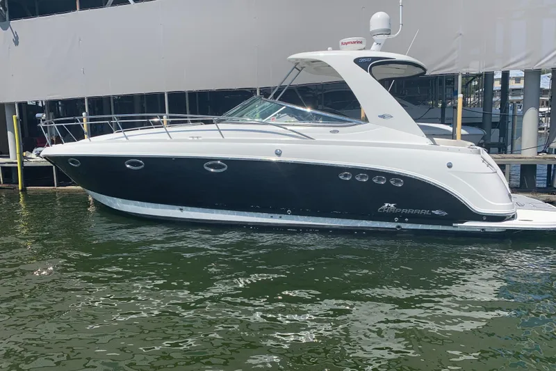 Slide: The Image of 2007 Chaparral 350 Signature boat docked in marina, side view. - 2
