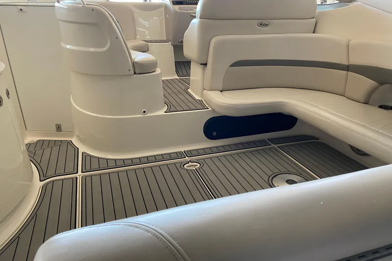 Slide: The Image of Interior of 2007 Chaparral 350 Signature boat with sleek seating and modern flooring. - 8