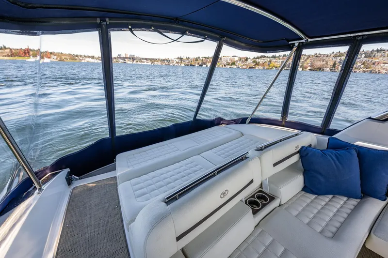 Slide: The Image of Luxurious interior of 2019 Cobalt R30 boat with waterfront view. - 8