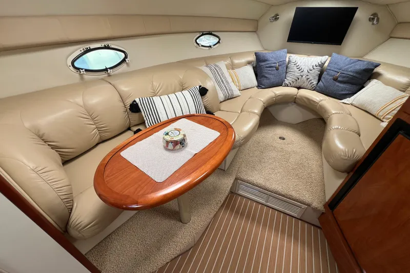 Slide: The Image of Luxurious 2007 Larson Cabrio 310 cabin interior with plush seating and elegant decor. - 46