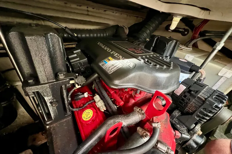 Slide: The Image of Engine compartment of a 2007 Larson Cabrio 310 boat with Volvo Penta engine. - 54