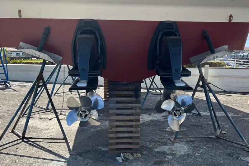 Slide: The Image of 2007 Larson Cabrio 310 boat propellers and stern drive on dry dock. - 8