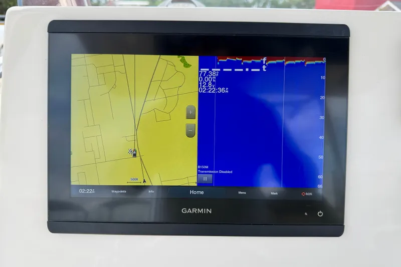 Slide: The Image of Garmin navigation display on 2021 Key West 263 FS boat, showing map and depth data. - 14