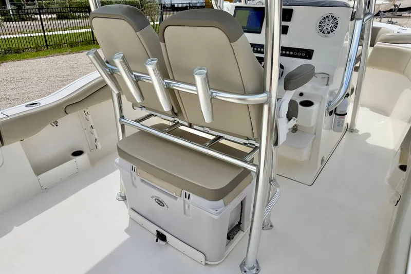 Slide: The Image of 2021 Key West 263 FS boat interior with seating and console features. - 19