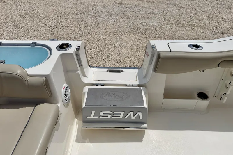 Slide: The Image of 2021 Key West 263 FS boat interior with seating and storage compartments. - 39
