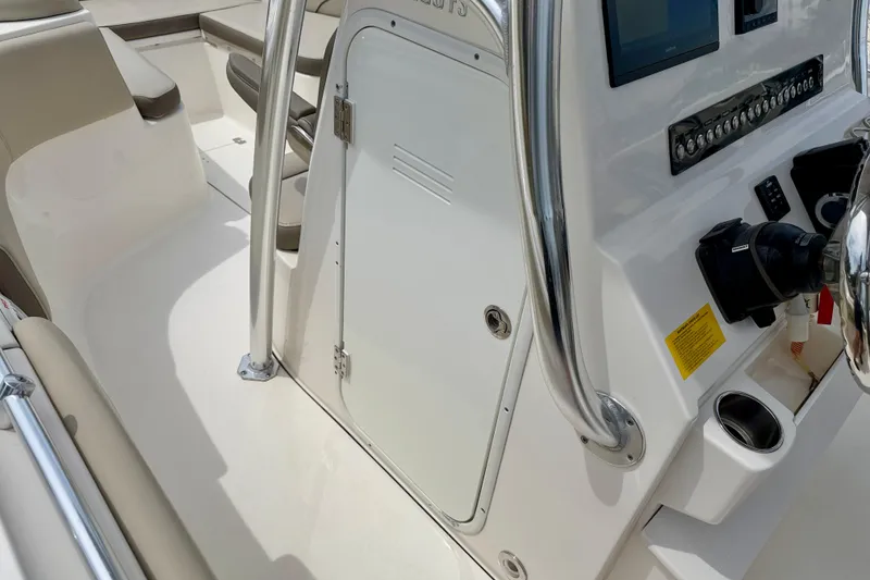 Slide: The Image of 2021 Key West 263 FS boat interior with control panel and seating area. - 41