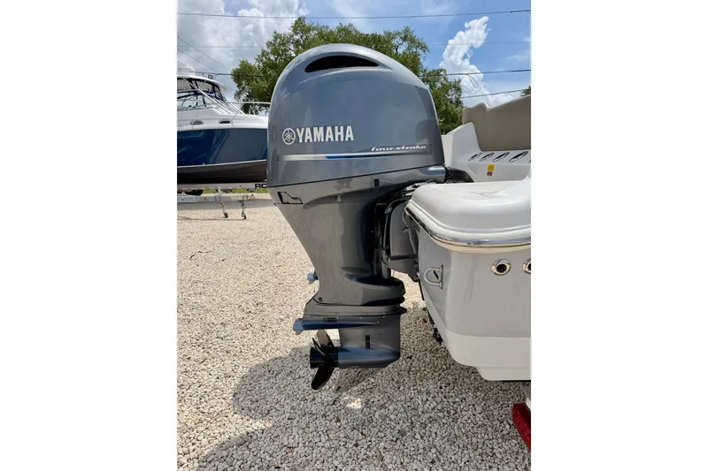 Slide: The Image of Yamaha four-stroke outboard motor on 2021 Key West 263 FS boat. - 46