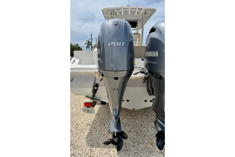 Slide: The Image of 2021 Key West 263 FS boat with dual Yamaha 200 outboard engines. - 49