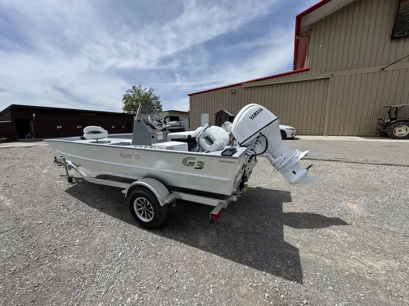 Slide: The Image of 2026 G3 Bay 17 boat with Yamaha motor on trailer. - 2