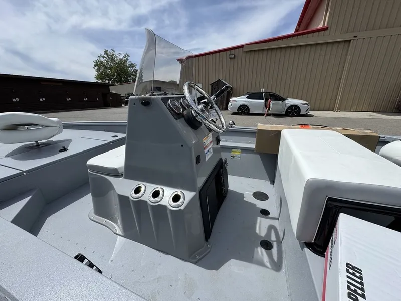 Slide: The Image of G3 Bay 17 boat 2026 with steering console outdoors. - 3