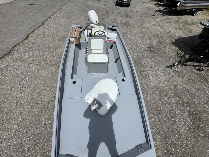 Slide: The Image of G3 Bay 17 boat 2026 parked on gravel lot. - 5