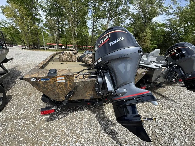 Slide: The Image of 2026 G3 Sportsman 1810 PFX boat with Yamaha motor outdoors. - 4