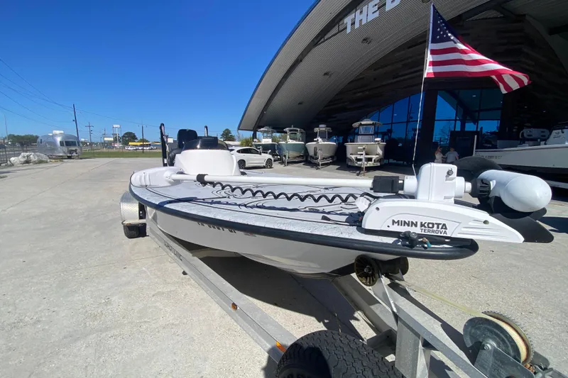 Slide: The Image of 2020 Coastal Custom Boats 23' Fury with Minn Kota Terrova motor on trailer. - 10