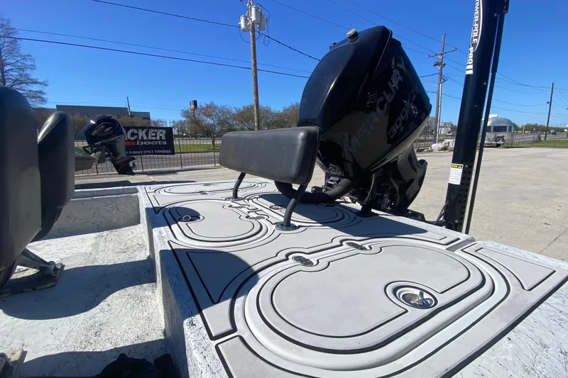 Slide: The Image of 2020 Coastal Custom Boats 23' Fury with Mercury outboard motor, featuring a sleek deck design. - 18