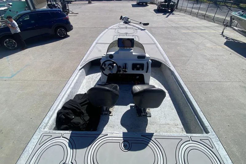 Slide: The Image of 2020 Coastal Custom Boats 23' Fury, sleek design, dual seats, and modern dashboard. - 19