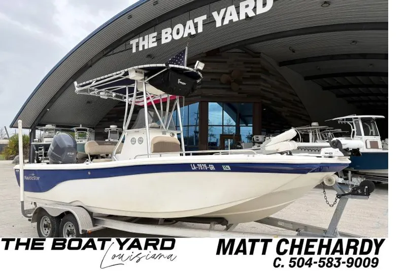 The Image of 2014 NauticStar 210 Coastal boat on trailer at The Boat Yard, Louisiana. - 1
