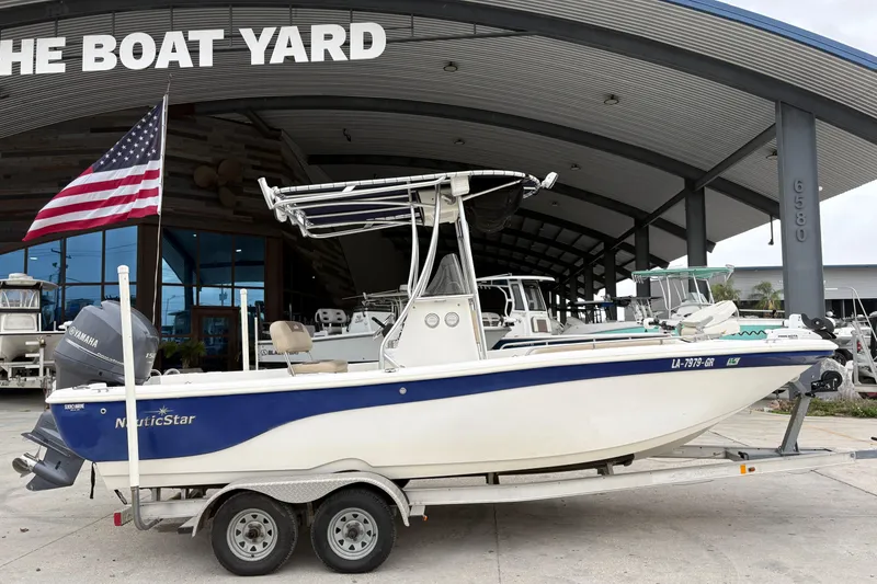 Slide: The Image of 2014 NauticStar 210 Coastal boat on trailer at The Boat Yard dealership. - 3