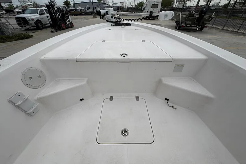 Slide: The Image of Kenner 21 VISION 2000 boat interior, featuring spacious deck and storage compartments. - 13